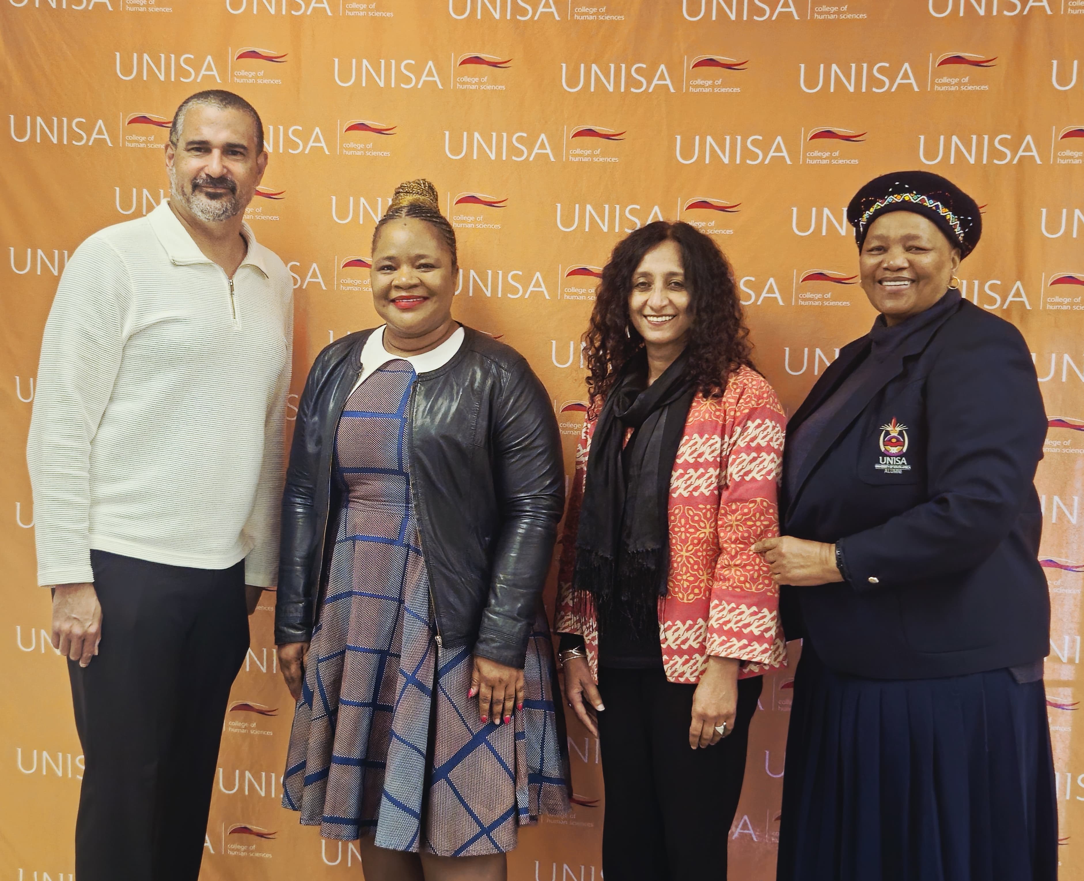 Dean_and CHS colleagues.jpg